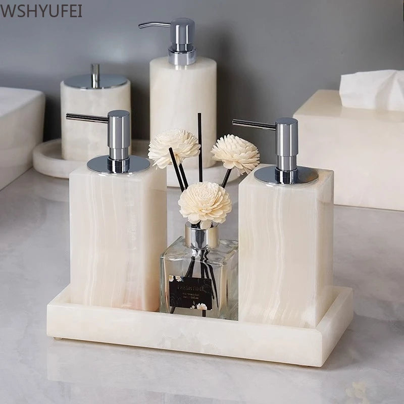 White Jade Stone Bathroom Accessory Set displayed on a modern bathroom countertop with resin and floral elements.